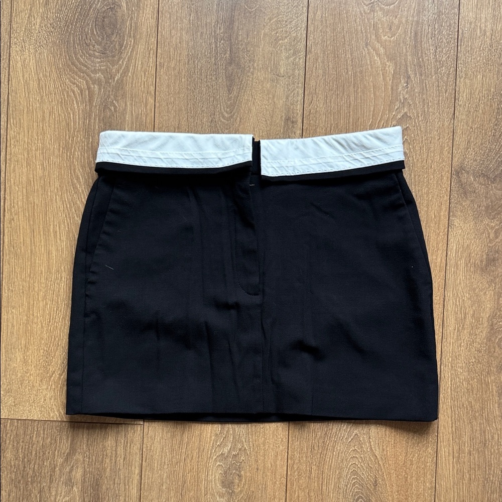 Babaton Black Mini Skirt with Cream Accent